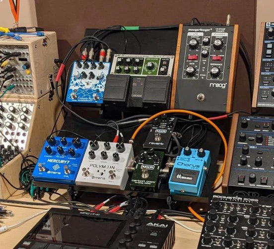 Two SynthRISE Expansion Shelves Large on stand with synth gear